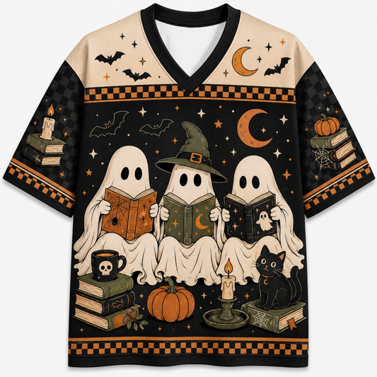 A short-sleeve V-neck t-shirt featuring a detailed Halloween graphic print. The design shows three ghosts reading books, a witch hat, a black cat, pumpkins, candles, and bats against a black and beige background with orange accents.