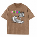 ChaoticClub Nothing Is Under Control Dog Washed T-Shirt, vintage oversized graphic tee featuring a dog skeleton in sunglasses lounging with coffee while a house burns in the background and funny sarcastic text on premium washed cotton fabric