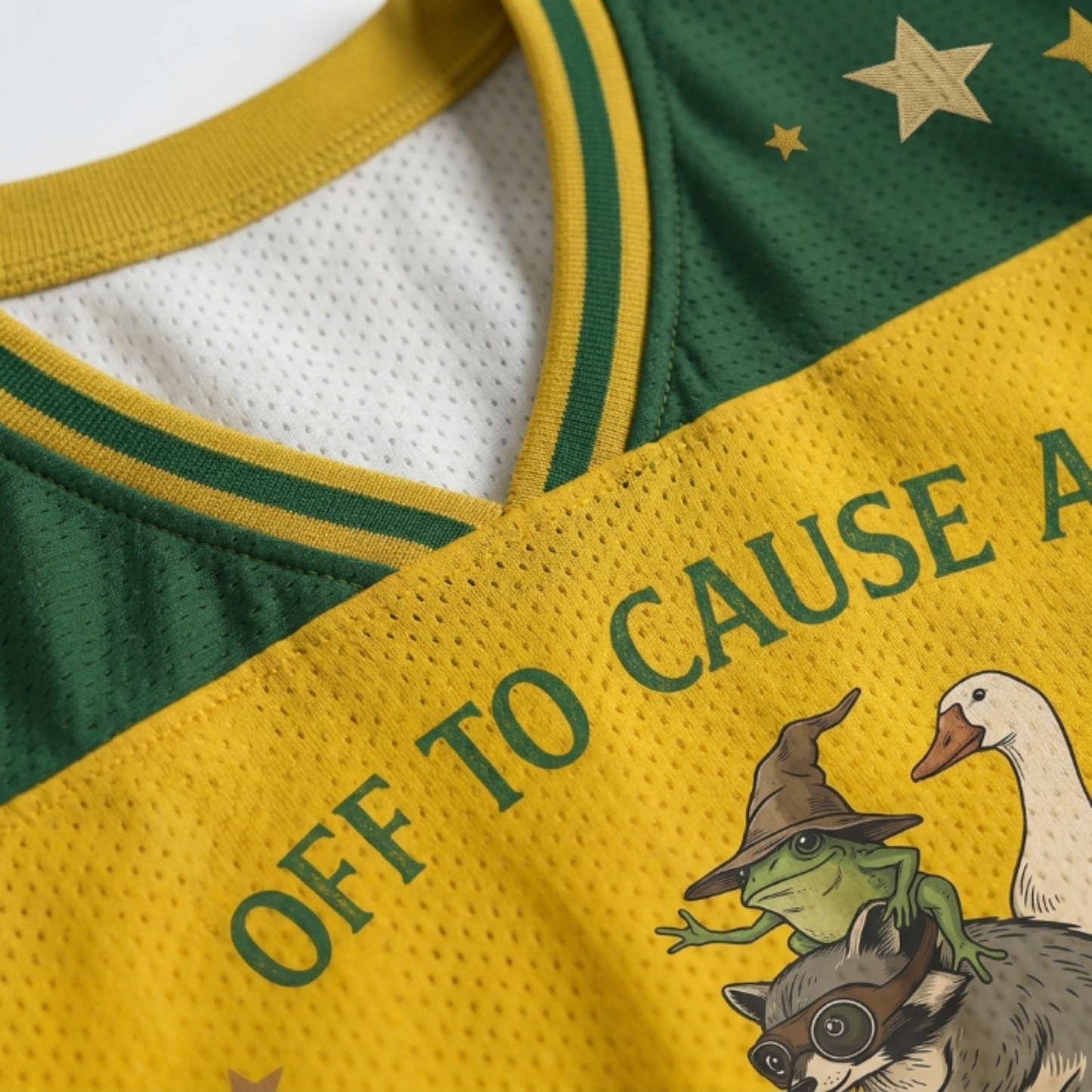 ChaoticClub Off To Cause A Kerfuffle Mesh Jersey, vintage streetwear athletic jersey featuring a raccoon, duck, and frog riding a dachshund with funny text on yellow and green breathable mesh fabric