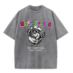 ChaoticClub Undiagnosed Raccoon Washed T-Shirt, vintage oversized graphic tee featuring a cowboy raccoon riding a goose with funny sarcastic text on premium charcoal washed cotton fabric
