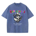 ChaoticClub Undiagnosed Raccoon Washed T-Shirt, vintage oversized graphic tee featuring a cowboy raccoon riding a goose with funny sarcastic text on premium charcoal washed cotton fabric