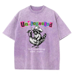 ChaoticClub Undiagnosed Raccoon Washed T-Shirt, vintage oversized graphic tee featuring a cowboy raccoon riding a goose with funny sarcastic text on premium charcoal washed cotton fabric