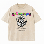 ChaoticClub Undiagnosed Raccoon Washed T-Shirt, vintage oversized graphic tee featuring a cowboy raccoon riding a goose with funny sarcastic text on premium charcoal washed cotton fabric