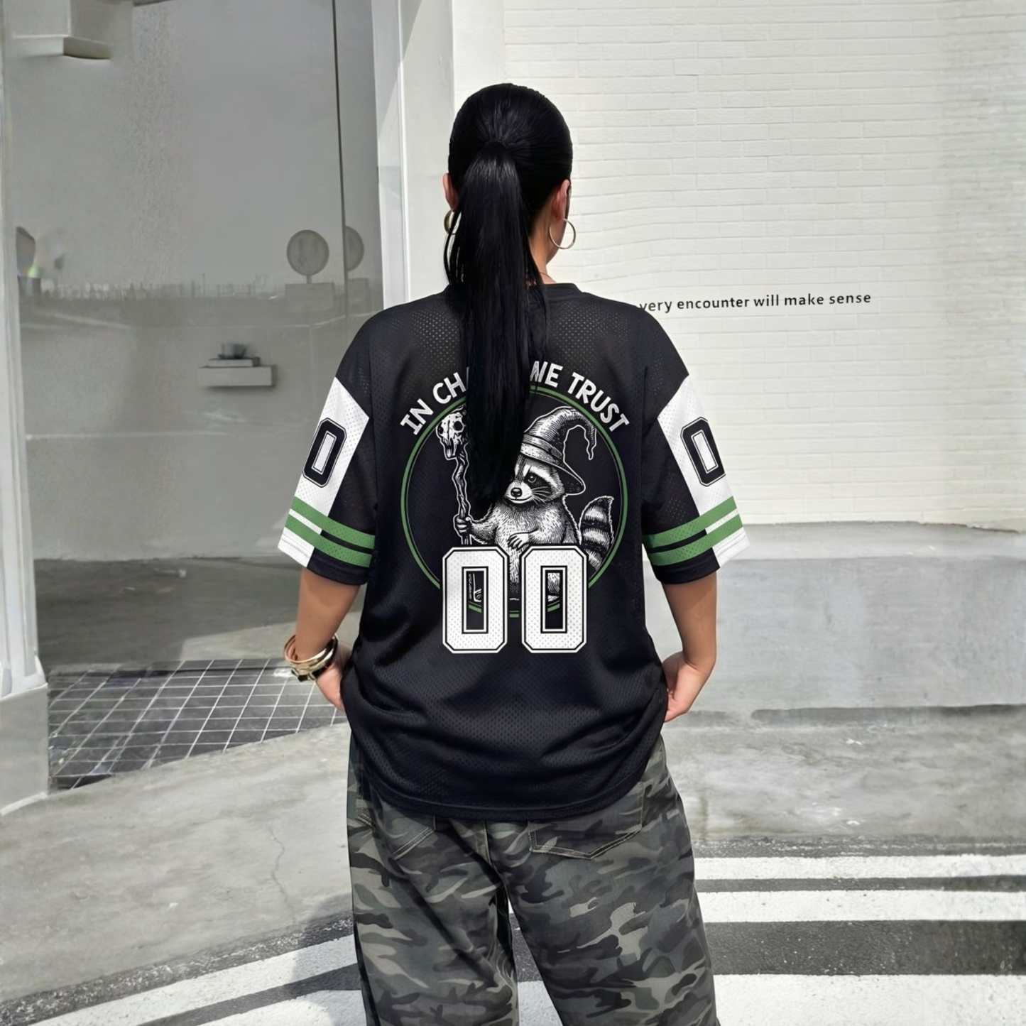 ChaoticClub Off To Commit Tomfoolery Raccoon Mesh Jersey, vintage streetwear athletic jersey featuring a wizard raccoon and "In Chaos We Trust" graphic on breathable black and green mesh fabric
