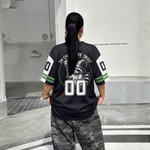 ChaoticClub Off To Commit Tomfoolery Raccoon Mesh Jersey, vintage streetwear athletic jersey featuring a wizard raccoon and "In Chaos We Trust" graphic on breathable black and green mesh fabric