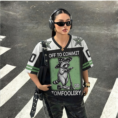 ChaoticClub Off To Commit Tomfoolery Raccoon Mesh Jersey, vintage streetwear athletic jersey featuring a wizard raccoon and "In Chaos We Trust" graphic on breathable black and green mesh fabric