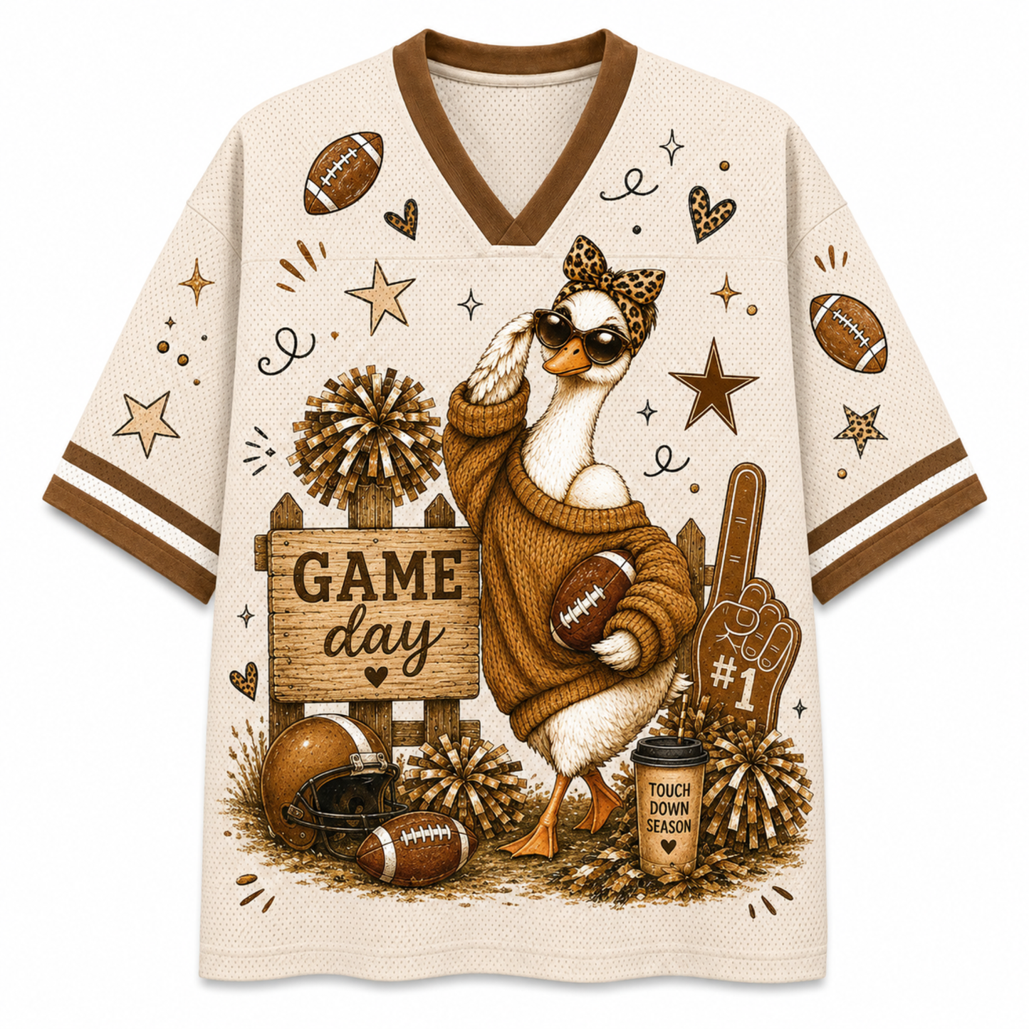 A cream-colored athletic-style V-neck t-shirt with brown trim, featuring a detailed graphic of a duck character wearing sunglasses and a sweater, holding a football, surrounded by footballs, stars, pom-poms, a helmet, a foam finger, and a coffee cup that reads 'TOUCH DOWN SEASON'.