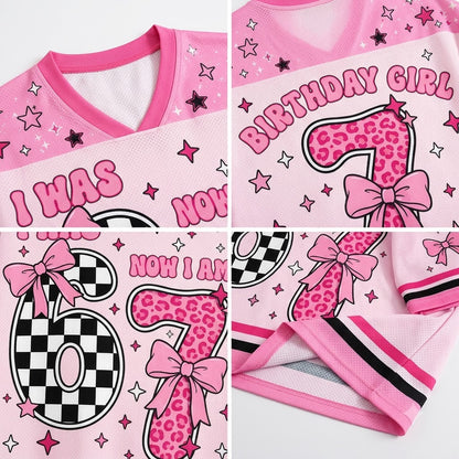 Pink mesh V-neck jersey top with birthday girl number 6 graphics, including leopard print numbers, pink bows, stars, checkered patterns, and text reading 'BIRTHDAY GIRL' and 'NOW I AM 6'.