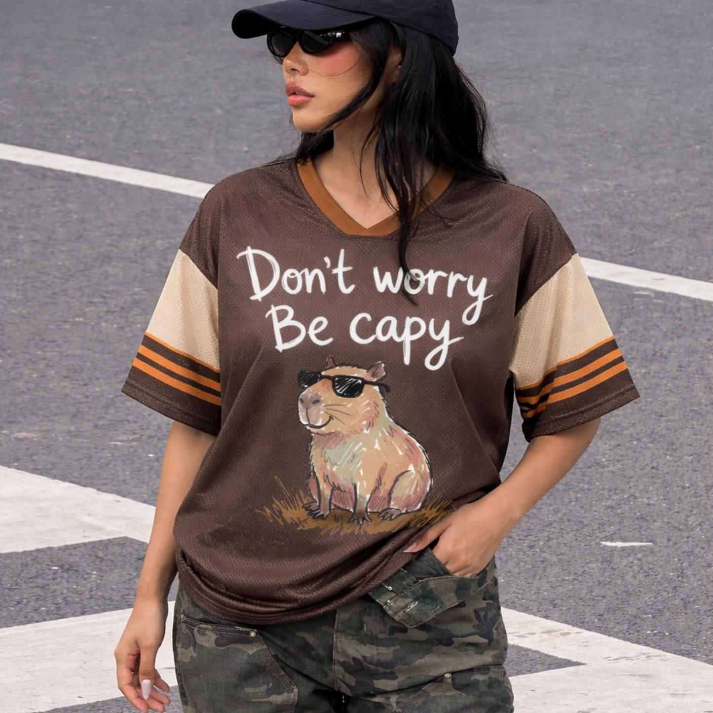 ChaoticClub Don’t Worry Be Capybara Mesh Jersey, vintage athletic oversized jersey on dark brown and tan breathable mesh featuring a chill capybara in sunglasses with "Don't worry Be capy" funny text.