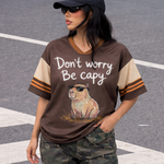 ChaoticClub Don’t Worry Be Capybara Mesh Jersey, vintage athletic oversized jersey on dark brown and tan breathable mesh featuring a chill capybara in sunglasses with "Don't worry Be capy" funny text.