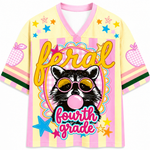 ChaoticClub Feral Raccoon Bubblegum Striped Mesh Jersey in pastel yellow and pink, featuring a sassy raccoon blowing a bubble with pink sunglasses, surrounded by stars and "feral fourth grade" text.