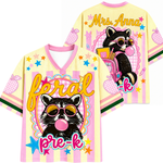 Front and back views of the ChaoticClub Feral Raccoon Bubblegum Striped Mesh Jersey. The front features a sassy raccoon face with "feral pre-k" text, while the back shows the raccoon with a school backpack and customizable teacher name.