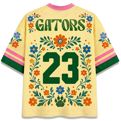Back view of the ChaoticClub Floral School Spirit Personalized Mesh Jersey, showcasing bold "GATORS" text above a large green varsity number "23", framed by matching floral vines and a prominent paw print icon at the bottom.