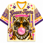 Colorful sports jersey with a tiger design and 'Geaux Tigers' text on a white background