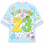 ChaoticClub mesh jersey back view showing “YOUR NAME 23” customizable print with cute fruit cartoon illustrations and vibrant pastel design
