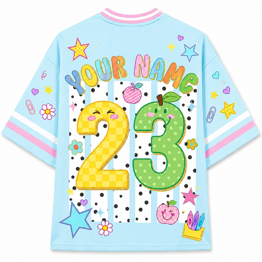 ChaoticClub mesh jersey back view showing “YOUR NAME 23” customizable print with cute fruit cartoon illustrations and vibrant pastel design