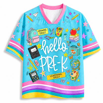 Front view of the light blue ChaoticClub Hello Team Level Teacher Mesh Jersey, featuring bold white "hello PRE-K" text surrounded by school supplies like a backpack, crayons, notebooks, an apple on books, a globe, and butterflies.