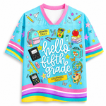 Front view of the light blue ChaoticClub Hello Team Level Teacher Mesh Jersey, featuring bold white "hello FIFTH GRADE" text surrounded by school supplies like a backpack, crayons, notebooks, an apple on books, a globe, and butterflies.