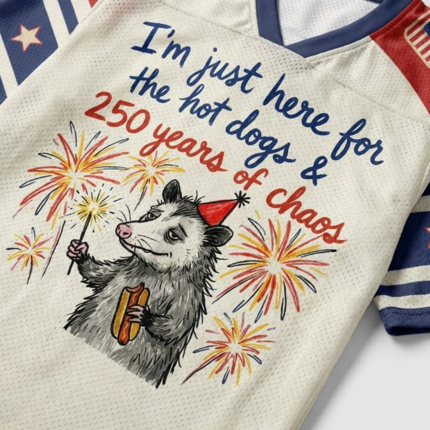 ChaoticClub Here For Hot Dogs & Chaos Possum Mesh Jersey, vintage athletic oversized jersey on patriotic cream, red, and blue breathable mesh featuring an opossum with a hot dog and sparkler amidst fireworks with "250 years of chaos" text.