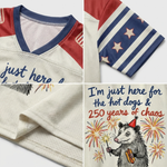 ChaoticClub Here For Hot Dogs & Chaos Possum Mesh Jersey, vintage athletic oversized jersey on patriotic cream, red, and blue breathable mesh featuring an opossum with a hot dog and sparkler amidst fireworks with "250 years of chaos" text.