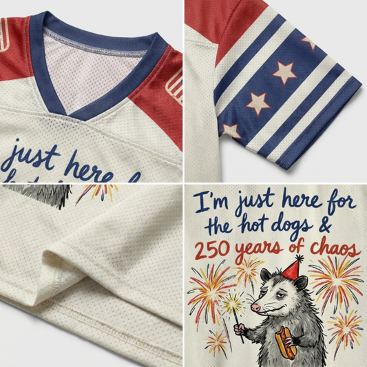 ChaoticClub Here For Hot Dogs & Chaos Possum Mesh Jersey, vintage athletic oversized jersey on patriotic cream, red, and blue breathable mesh featuring an opossum with a hot dog and sparkler amidst fireworks with "250 years of chaos" text.