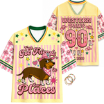 Two colorful shirts with graphics and text, one featuring a dachshund and the other with 'Western Paws 90' text.