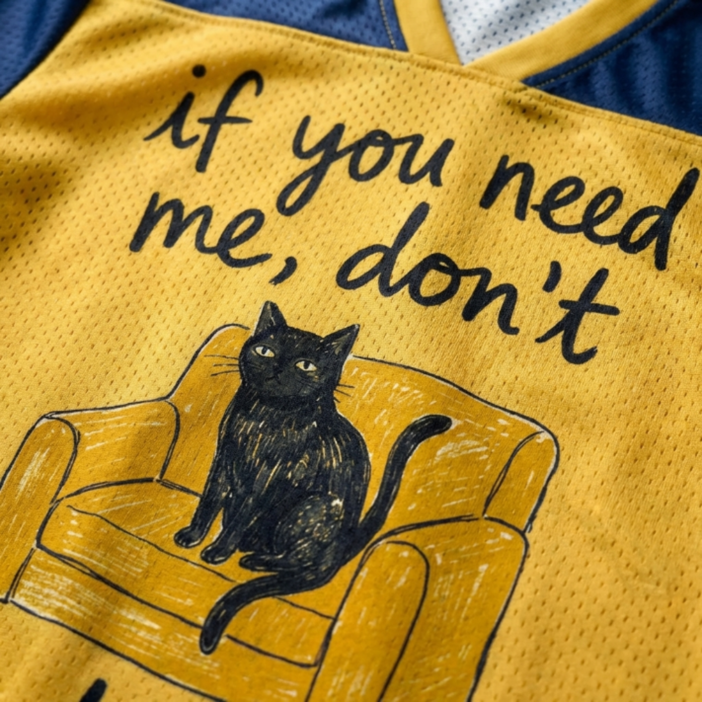 ChaoticClub If You Need Me Don’t Cat Meme Mesh Jersey, vintage athletic oversized jersey on yellow and navy blue breathable mesh featuring a black cat sitting on a chair with "if you need me, don't" funny sarcastic text.