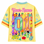 Colorful children's shirt with number 01 and crayon design on a yellow background