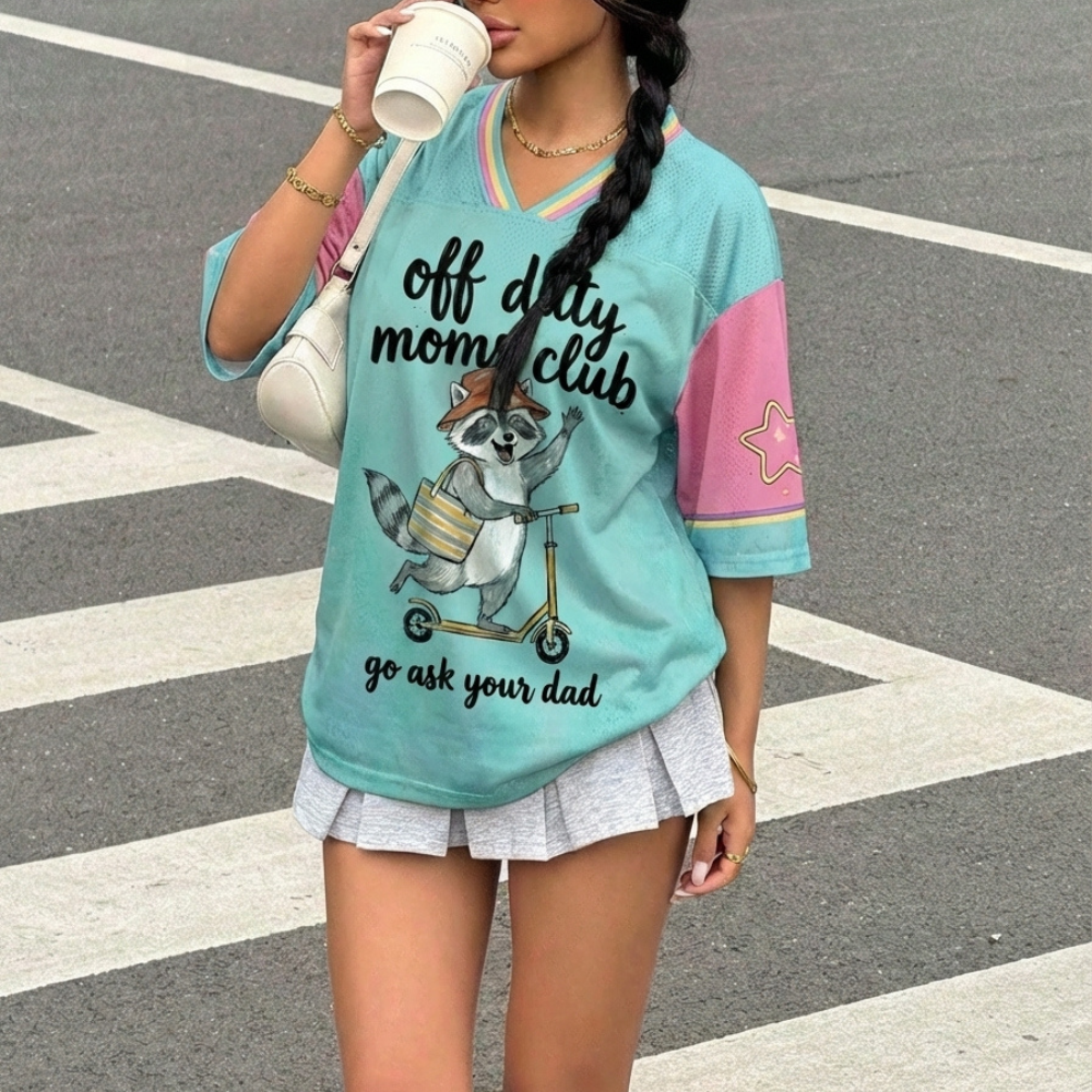 ChaoticClub Off Duty Moms Club Raccoon Mesh Jersey, vintage athletic oversized jersey on teal, pink, and yellow breathable mesh featuring a happy raccoon on a scooter with a tote bag and "off duty moms club go ask your dad" funny sarcastic text.
