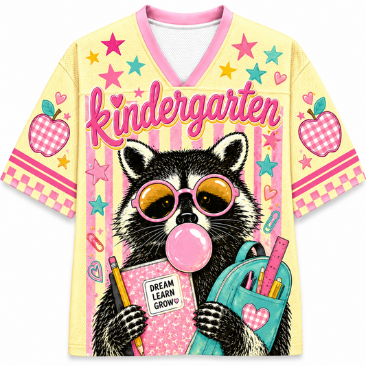 Front view of the ChaoticClub Pastel Bubblegum Raccoon Teacher Mesh Jersey, featuring a cute raccoon in pink sunglasses blowing bubblegum, a blue backpack, and bold "kindergarten" text on a pastel striped background.