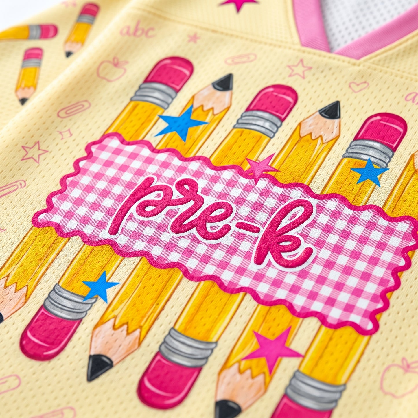 preppy mesh jersey close up showing breathable Bird’s Eye Pique fabric with pencil illustrations and high quality print detail