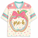 Front view of the ChaoticClub Preppy Back to School Teacher Apple Mesh Jersey, featuring a cute apple graphic with a pink bow, colorful polka dots, and gold glitter "pre-k" text.