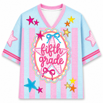 Colorful shirt with 'fifth grade love' text and star designs on a white background