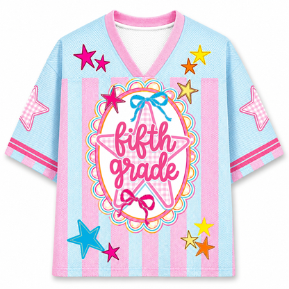 Colorful shirt with 'fifth grade love' text and star designs on a white background