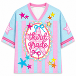 Children's jersey with 'third grade' text and star designs on a light blue background