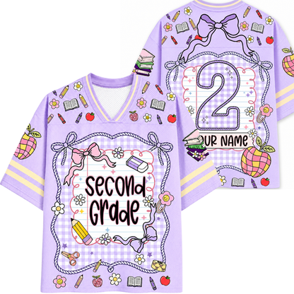 Purple 'Second Grade' shirt with decorative elements on a white background
