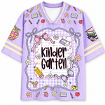 Purple shirt with kindergarten-themed graphics and text on a white background