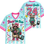 Two colorful t-shirts with raccoon graphics and text on a light blue background.