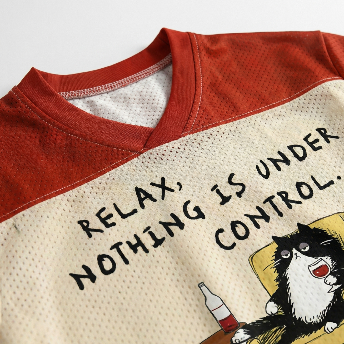 ChaoticClub Relax Nothing Is Under Control Mesh Jersey, vintage athletic oversized jersey on cream and rust red breathable mesh featuring a tuxedo cat lounging in a chair with a glass of wine and "Relax, nothing is under control" funny sarcastic text.