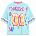Light blue jersey with colorful graphics and 'YOUR NAME 01' text on a white background