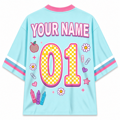 Light blue jersey with colorful graphics and 'YOUR NAME 01' text on a white background