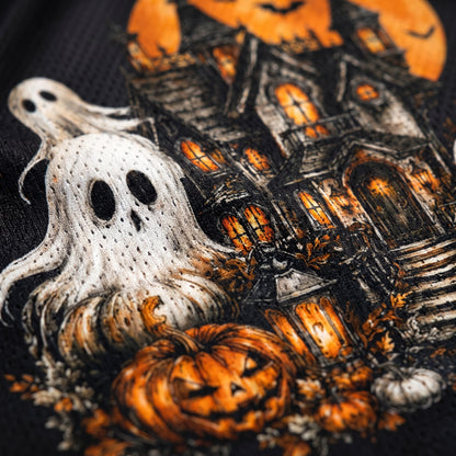 Embroidery design with ghost, pumpkins, and haunted house on a black background