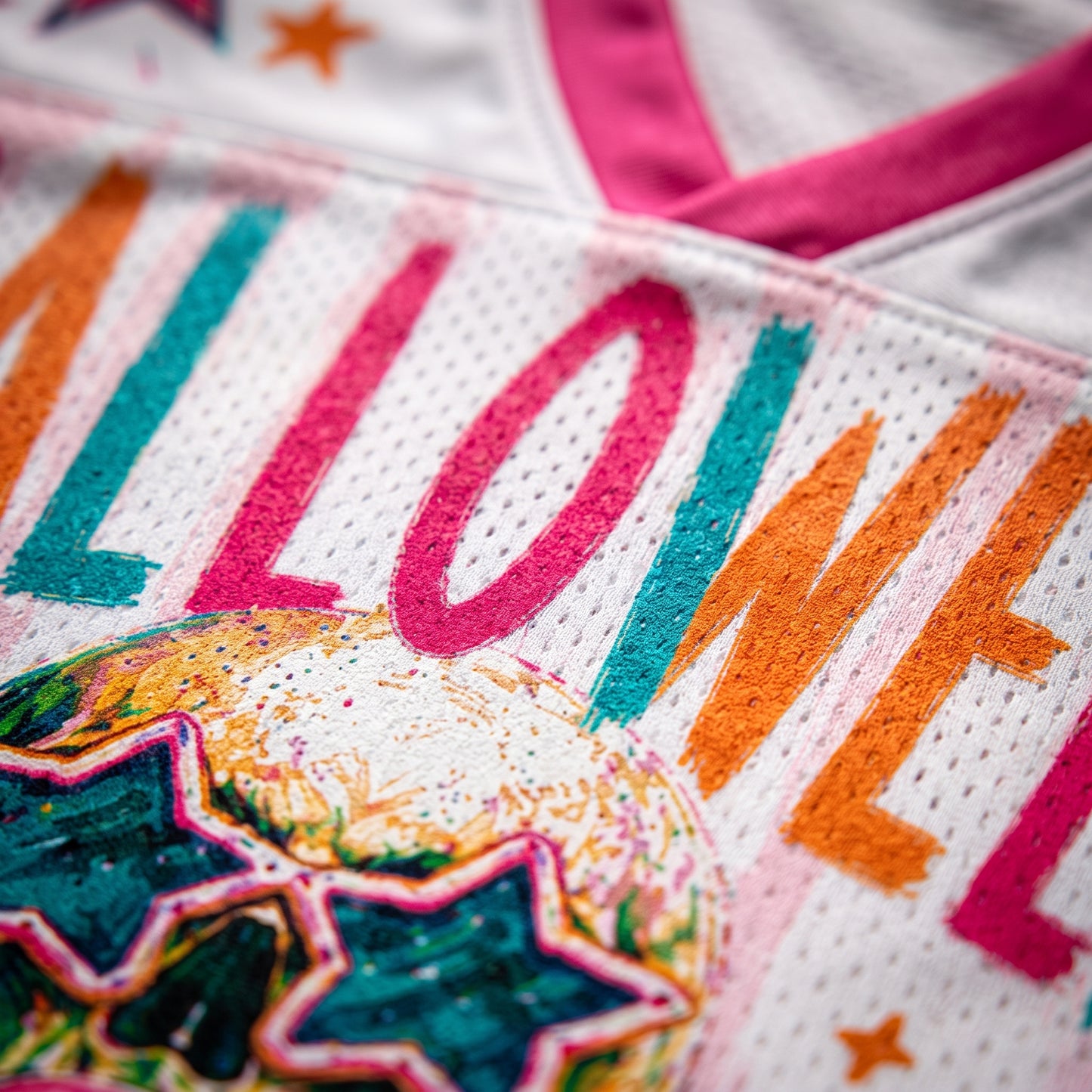 Detailed close up of ChaoticClub skull graphic wearing glittery star sunglasses and blowing a pink bubblegum bubble on white mesh fabric.