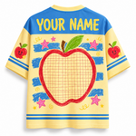 Children's t-shirt with a red apple design and space for 'Your Name' on a yellow and blue background.