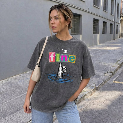 ChaoticClub I'm Fine Dog Washed T-Shirt, vintage oversized graphic tee featuring a furry dog paw giving a thumbs up while sinking into water with funny sarcastic text on premium washed cotton fabric
