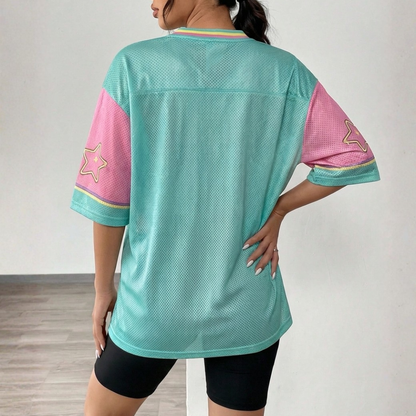ChaoticClub Off Duty Moms Club Raccoon Mesh Jersey, vintage athletic oversized jersey on teal, pink, and yellow breathable mesh featuring a happy raccoon on a scooter with a tote bag and "off duty moms club go ask your dad" funny sarcastic text.