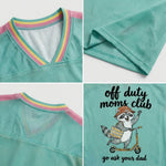 ChaoticClub Off Duty Moms Club Raccoon Mesh Jersey, vintage athletic oversized jersey on teal, pink, and yellow breathable mesh featuring a happy raccoon on a scooter with a tote bag and "off duty moms club go ask your dad" funny sarcastic text.