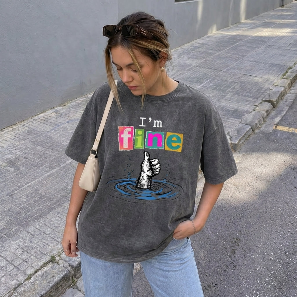 ChaoticClub I'm Fine Dog Washed T-Shirt, vintage oversized graphic tee featuring a furry dog paw giving a thumbs up while sinking into water with funny sarcastic text on premium washed cotton fabric
