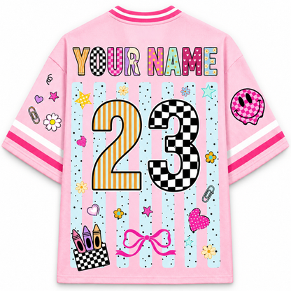 Pink varsity jacket with colorful text and graphics on a white background