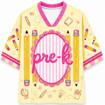 Yellow shirt with pink accents and 'pre-k' text, featuring pencils and educational symbols on a white background.